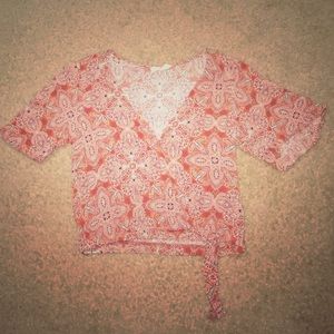 Brownish red tribal print blouse.